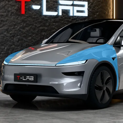 PPF ailes avant Tesla Model Y : la zone protégée en bleu, sur une Model Y Juniper Premium vue de trois quarts avant