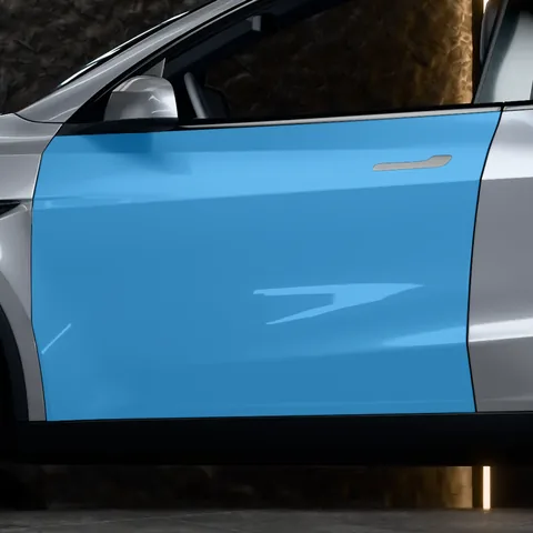 PPF portières avant Tesla Model Y : la zone protégée en bleu, sur une Model Y Juniper Premium vue de profil